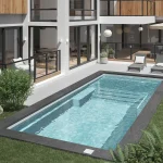 Piscine creusée en fibre de verre Mova, modèle 12x30 - Avec terrasse, finition Diamant couleur Mova