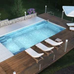 Piscine creusée en fibre de verre Mova, modèle 14x28 - Pente, finition Diamant couleur Mova, ambiance soirée éclairée