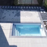 Piscine creusée en fibre de verre Mova, modèle 8x16, finition Diamant couleur Gris