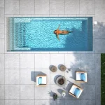 Piscine creusée en fibre de verre Mova, modèle 11x25, finition Diamant couleur Mova