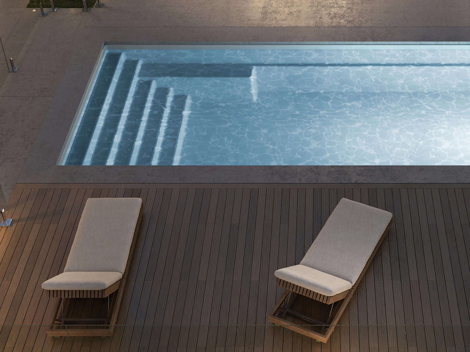 Piscine creusée en fibre de verre Mova, modèle 12x20, finition Diamant couleur Mova, ambiance soirée éclairée